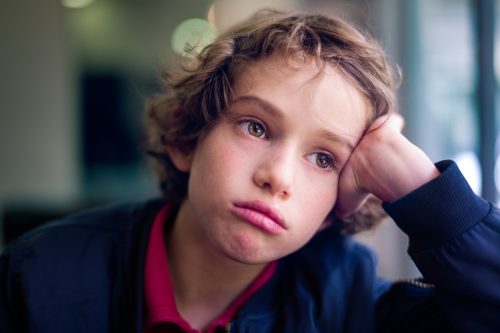 Boy with sad expression