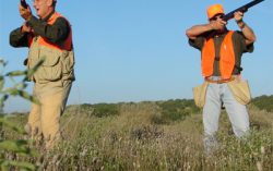 Two hunters are out in the woods when one of them collapses.