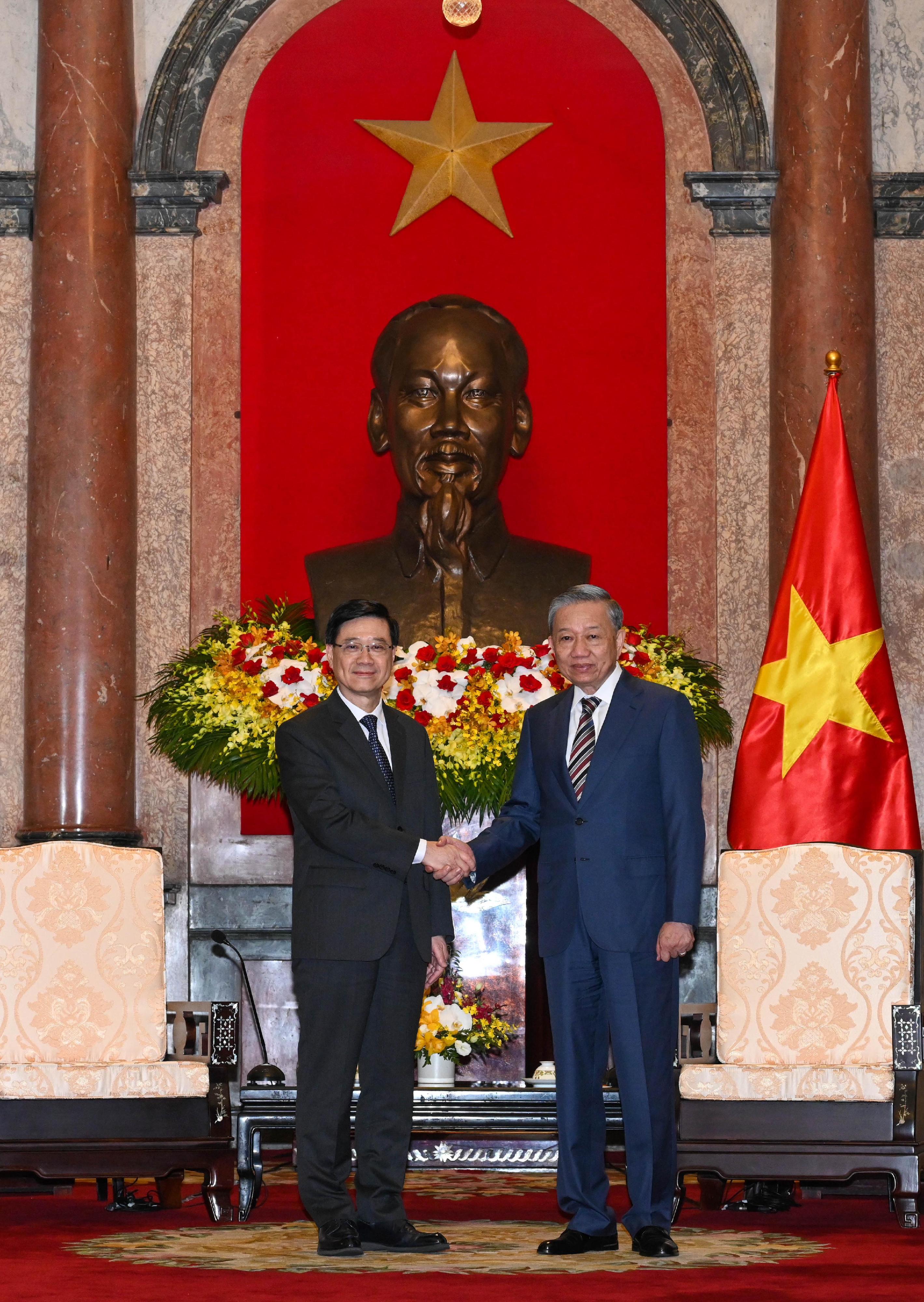 Hong Kong’s Chief Executive, Mr John Lee (left), meets with the President of Vietnam, Mr To Lam (right).