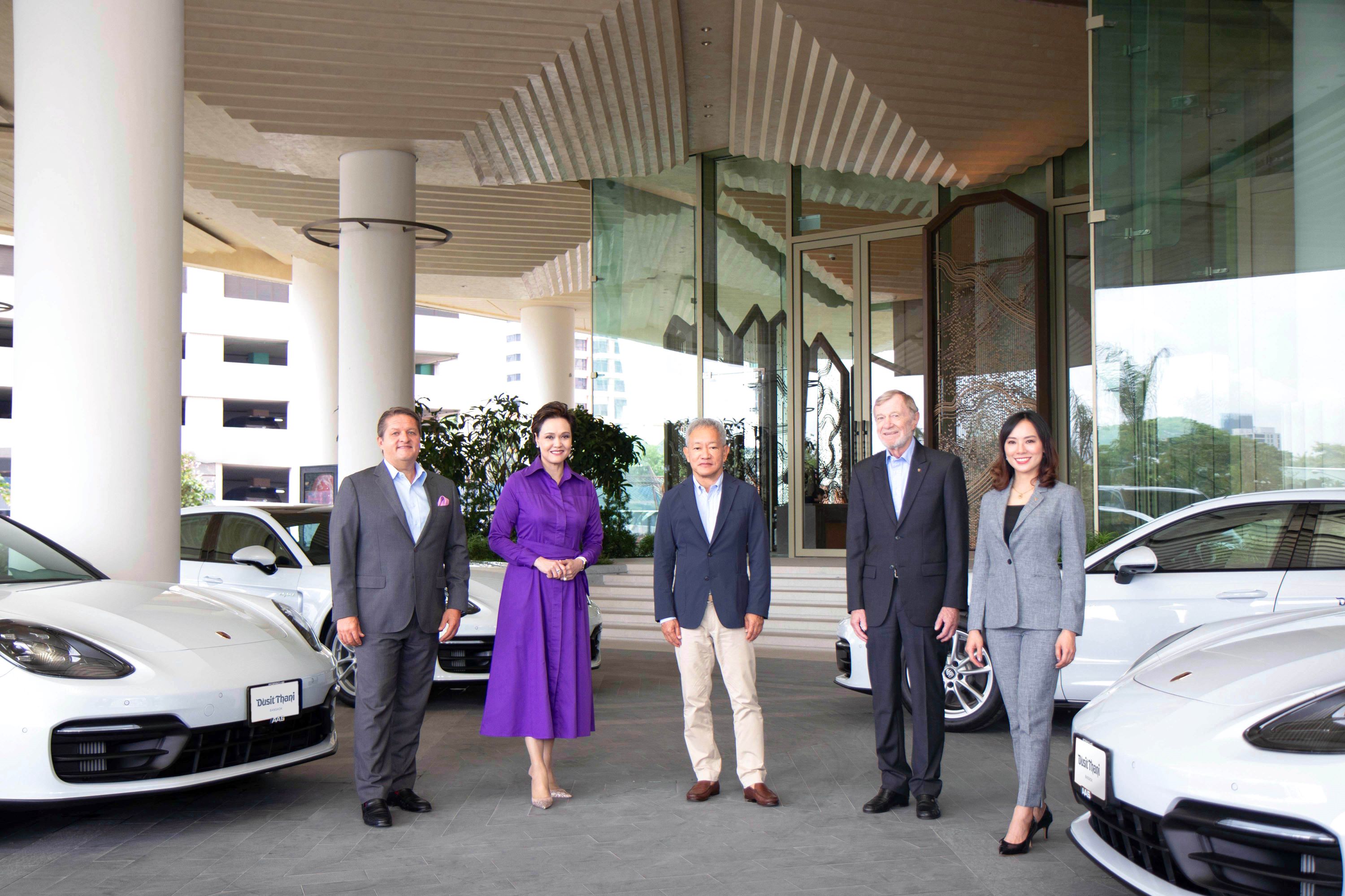 Dusit's partnership with Porsche Thailand is a testament to the company's dedication to providing extraordinary experiences for guests. Pictured (from left): Mr Adrian Rudin, Managing Director, Dusit Thani Bangkok; Ms Suphajee Suthumpun, Group CEO, Dusit International; Mr Chanin Donavanik, Vice Chairman and Chairman of the Executive Committee, Dusit International; Mr Peter Rohwer, Managing Director of Porsche Thailand by AAS Group; and Ms Pawarapa Dupassakoon, Marketing & PR Director, Porsche Thailand by AAS Group.