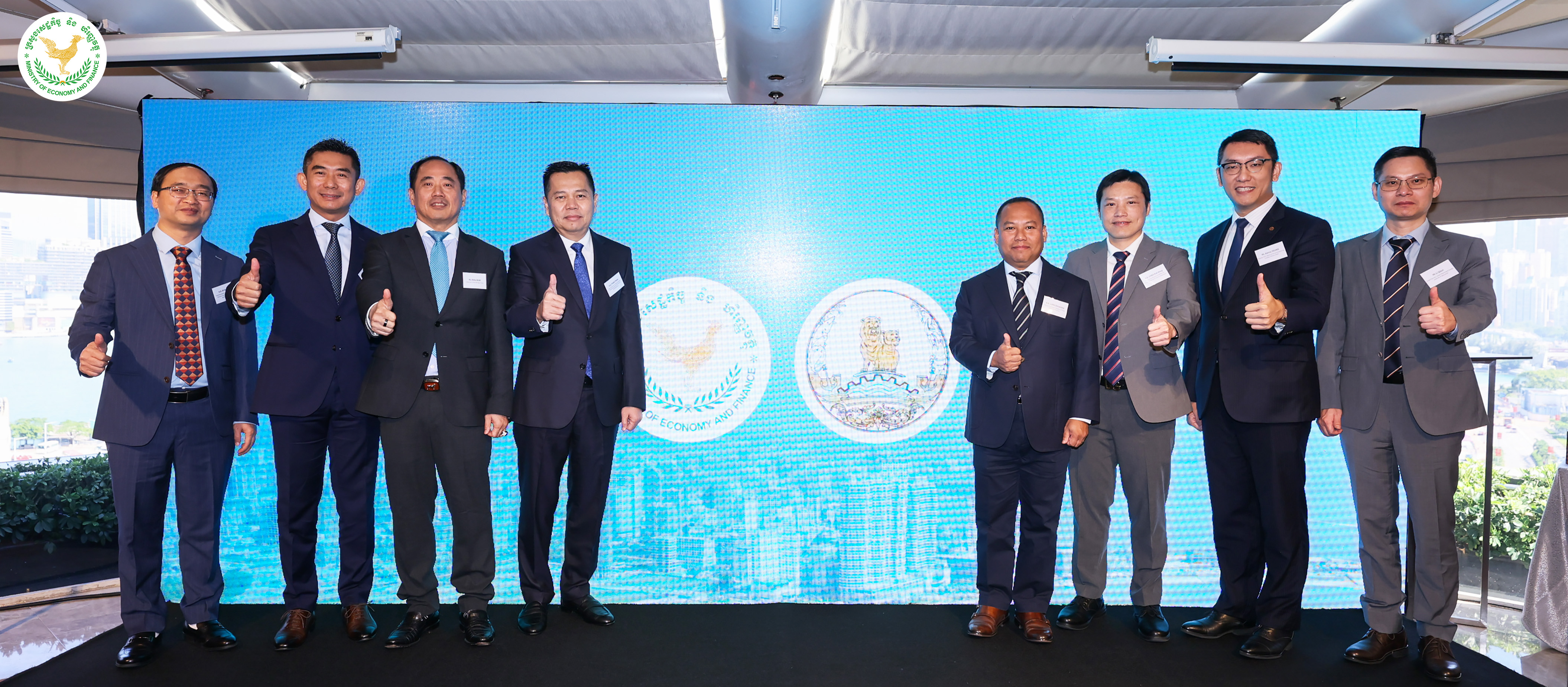 Delegates and Speakers at the Invest Preah Sihanouk Province Hong Kong Roadshow. From left to right: H.E. IM Sokthy, Chief Secretariat of Preah Sihanouk Province Investment Promotion Working Group; H.E. NUT Unvoanra, Deputy Secretary General of the Cambodian Investment Board; Mr. Rithy SEAR, Chairman of WorldBridge Group; H.E. Dr. PHAN Phalla, Vice Chairman of Preah Sihanouk Province Investment Promotion Working Group; H.E. LONG Dimanche, Deputy Provincial Governor of Preah Sihanouk Province; H.E. CHEA Kok Hong, Secretariat Director of MPSEZ for Preah Sihanouk Province Masterplan; Mr. Kenny Yeung, Deputy CEO, Bank of China (Hong Kong), Phnom Penh Branch; and Mr. Li Qijun, Chief Planner, Urban Planning & Design Institute of Shenzhen.