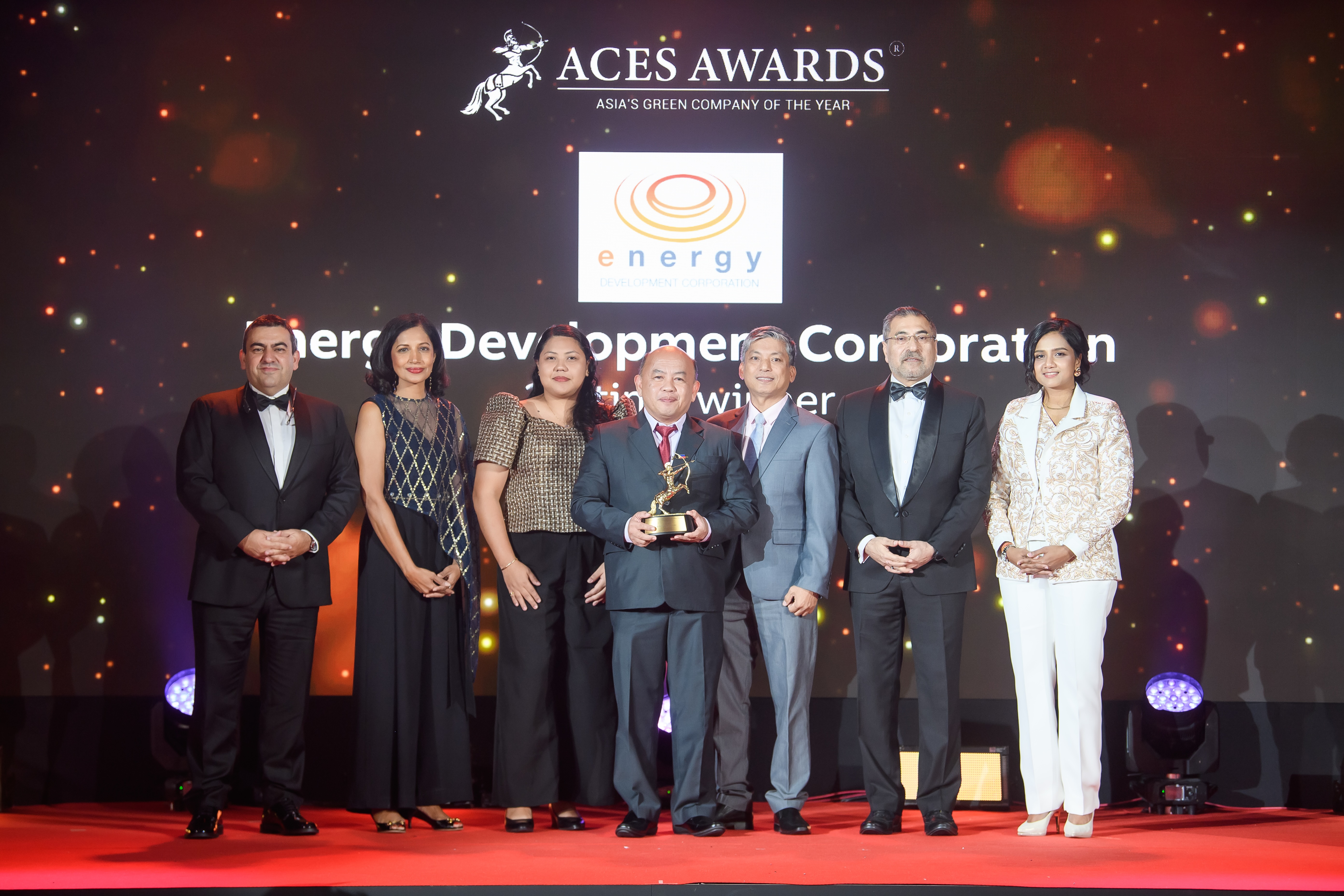 Energy Development Corporation was proudly honoured as Asia's Green Company of the Year at the ACES Awards 2024. Representing EDC on stage were Abegail Gatdula, Watershed Management Officer (left center), Erwin Magallanes, Head of Corporate Relations (center), and Danilo Tolarba, AVP & Human Resource Head (right center). The award was presented by Luis Bueno Nieto, Advisor, ACES Council (left), Dr Jayanthi Desan, Advisor, ACES Council (2nd from left), Dr Shanggari Balakrishnan, President, ACES Awards (right), and Hemant Batra, Honorary Chairman, ACES Council (2nd from right). This recognition cements EDC’s leadership in sustainability and green innovation across Asia.